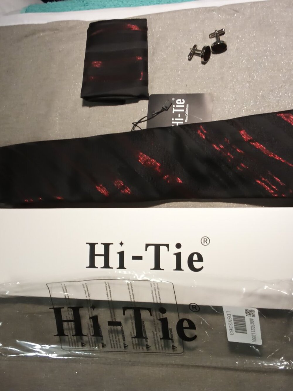 Men’s Black Tie, Matching Hankerchief, And Cuff Links with Red Accents